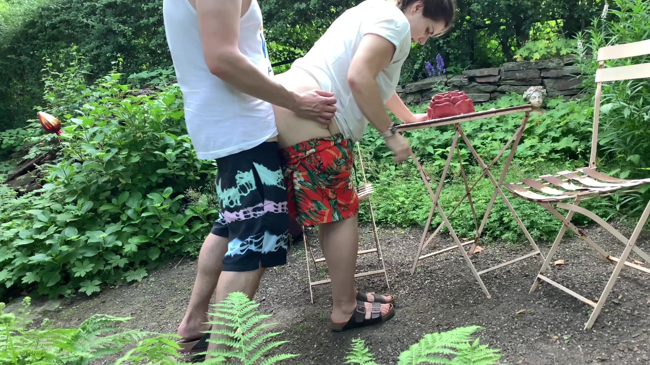 outdoor quickie - standing doggystyle in the garden photo