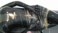 Latex catsuite ass video Two rubber layers black and transparent latex catsuit blowjob and pissing